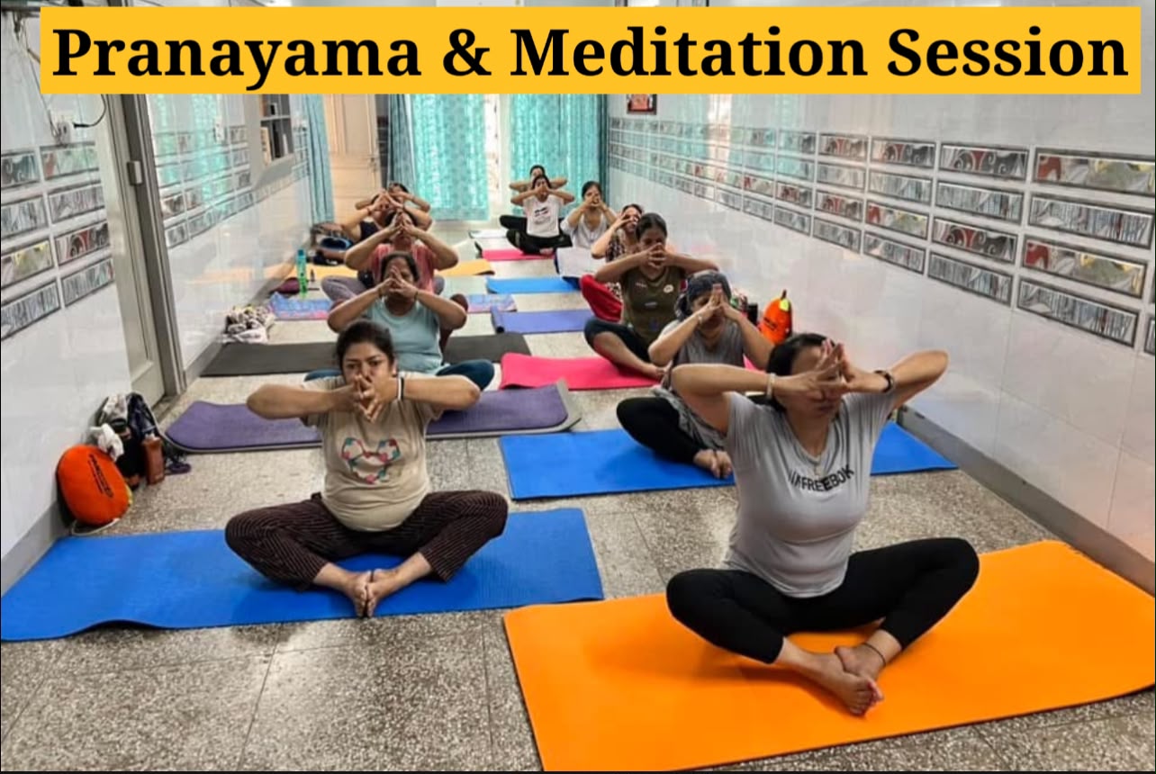 Group yoga formation class at Nirankari Yoga Centre — students practising together in Sector 4, Gurugram